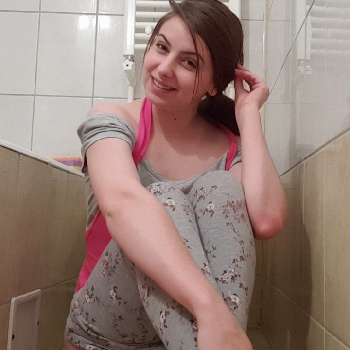 Eastern European girl strips off, pees in a glass then does a shit on the floor frontal view, she plays with her shit a little and also puts her feet on the shit. A lot of dirty talking throughout video. 1080p HD. 15 minutes 